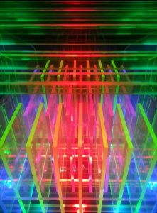 Glowing quantum computer processor with interconnected qubits floating in a blue digital space
