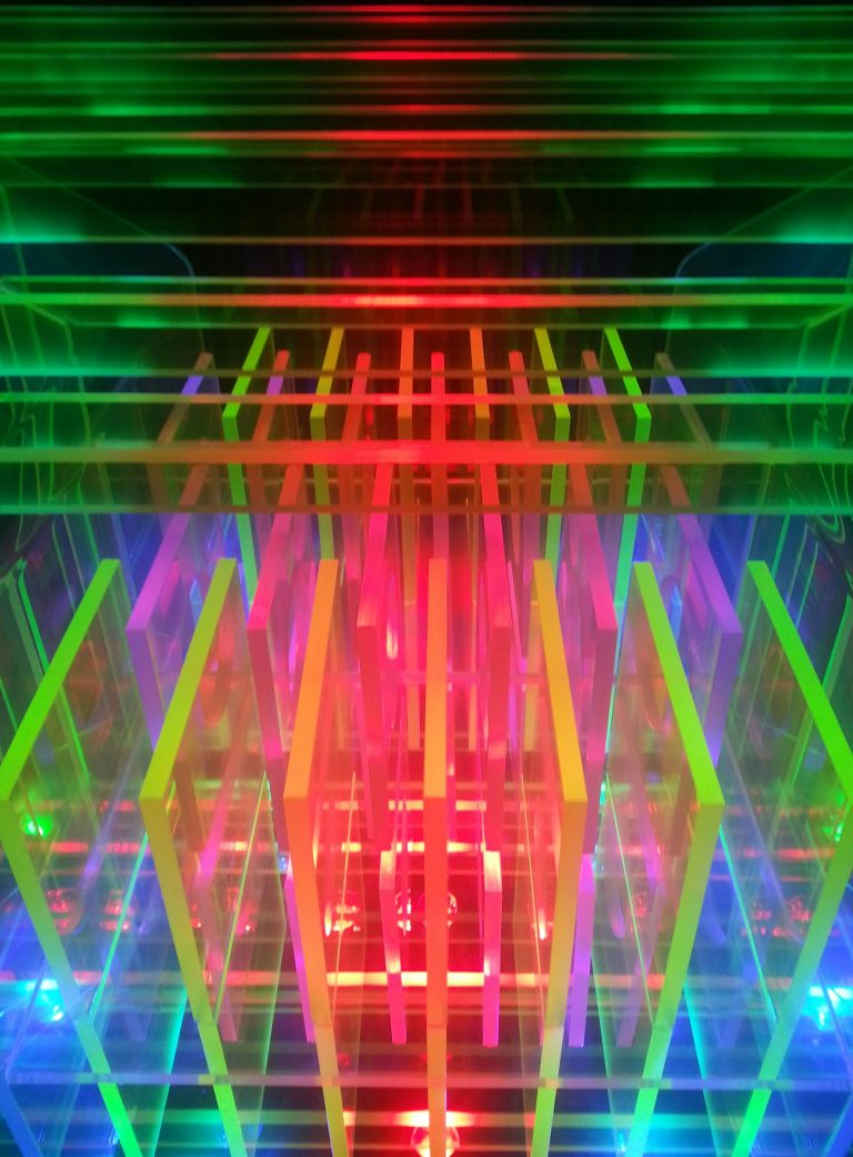 Glowing quantum computer processor with interconnected qubits floating in a blue digital space